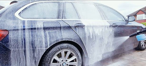 Washing a car with a pressure washer